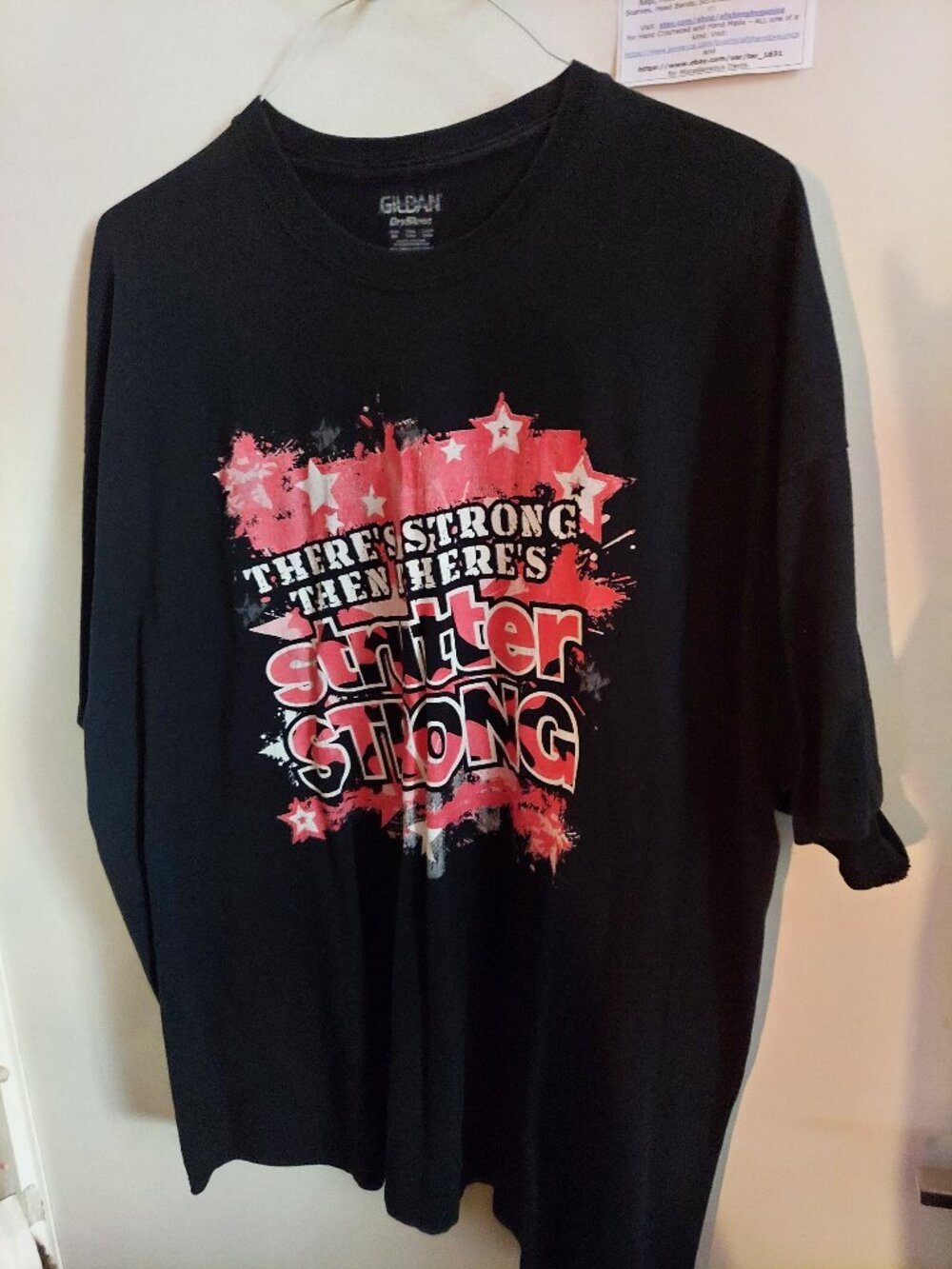 Gildan black t-shirt, Size XL, (There's Strong Then There's Strutter Strong)